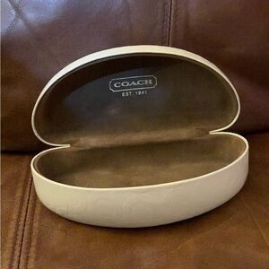 Coach Clam Shell
Hard Sided Glasses White Embossed Oval Case